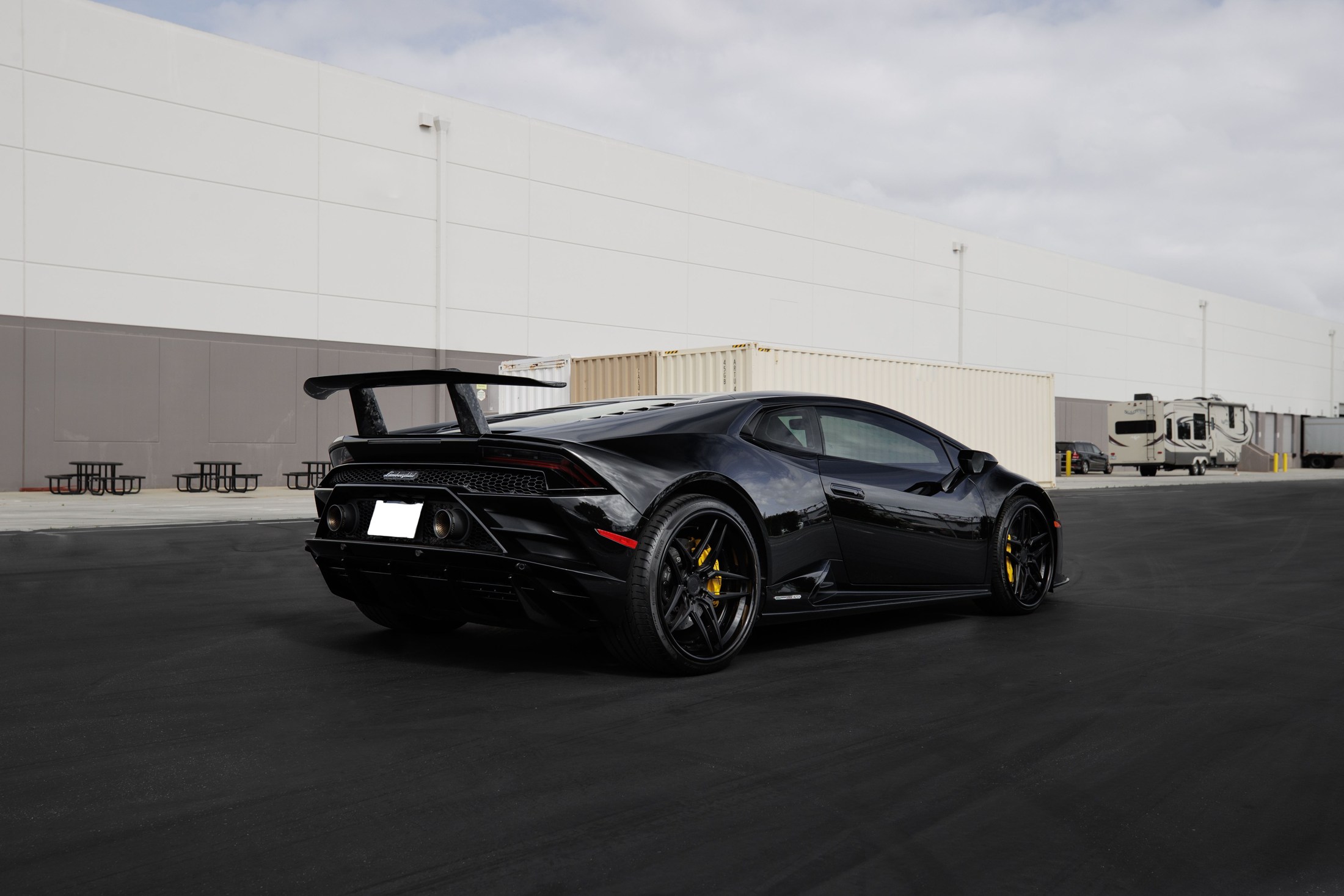 Black Lamborghini Huracan, illustrative brand photography